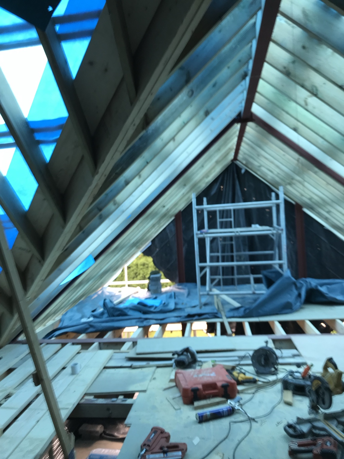 Dormer conversion roof framing and work area