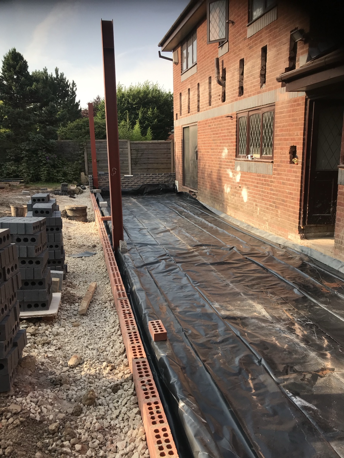 Ground preparation beside the existing rear wall — Rear Double Extension, Ellenbrook, Worsley