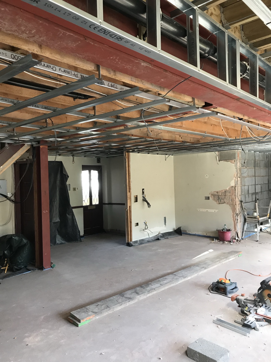 Internal steelwork and floor area ready for underfloor heating — Rear Double Extension, Ellenbrook, Worsley