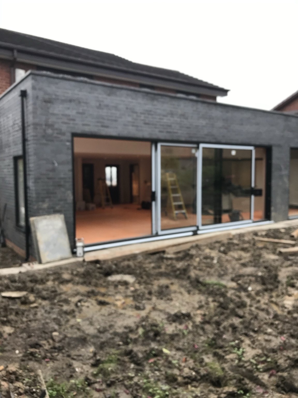 Exterior view of the rear extension with parapet roof — Rear Double Extension, Ellenbrook, Worsley